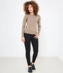 Maglia con bottoni ai polsi