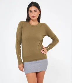 Maglia con bottoni ai polsi