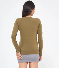 Maglia con bottoni ai polsi