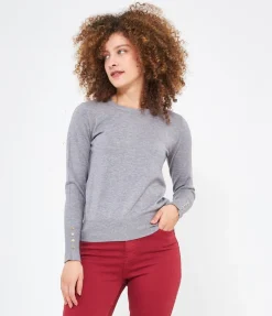 Maglia con bottoni ai polsi