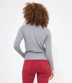 Maglia con bottoni ai polsi