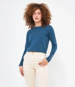 Maglia con bottoni ai polsi
