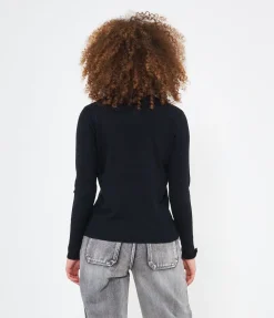 Maglia con bottoni ai polsi