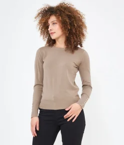 Maglia con bottoni ai polsi