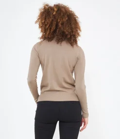 Maglia con bottoni ai polsi