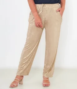 Pantaloni effetto laminato