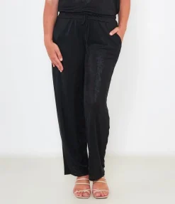 Pantaloni effetto laminato